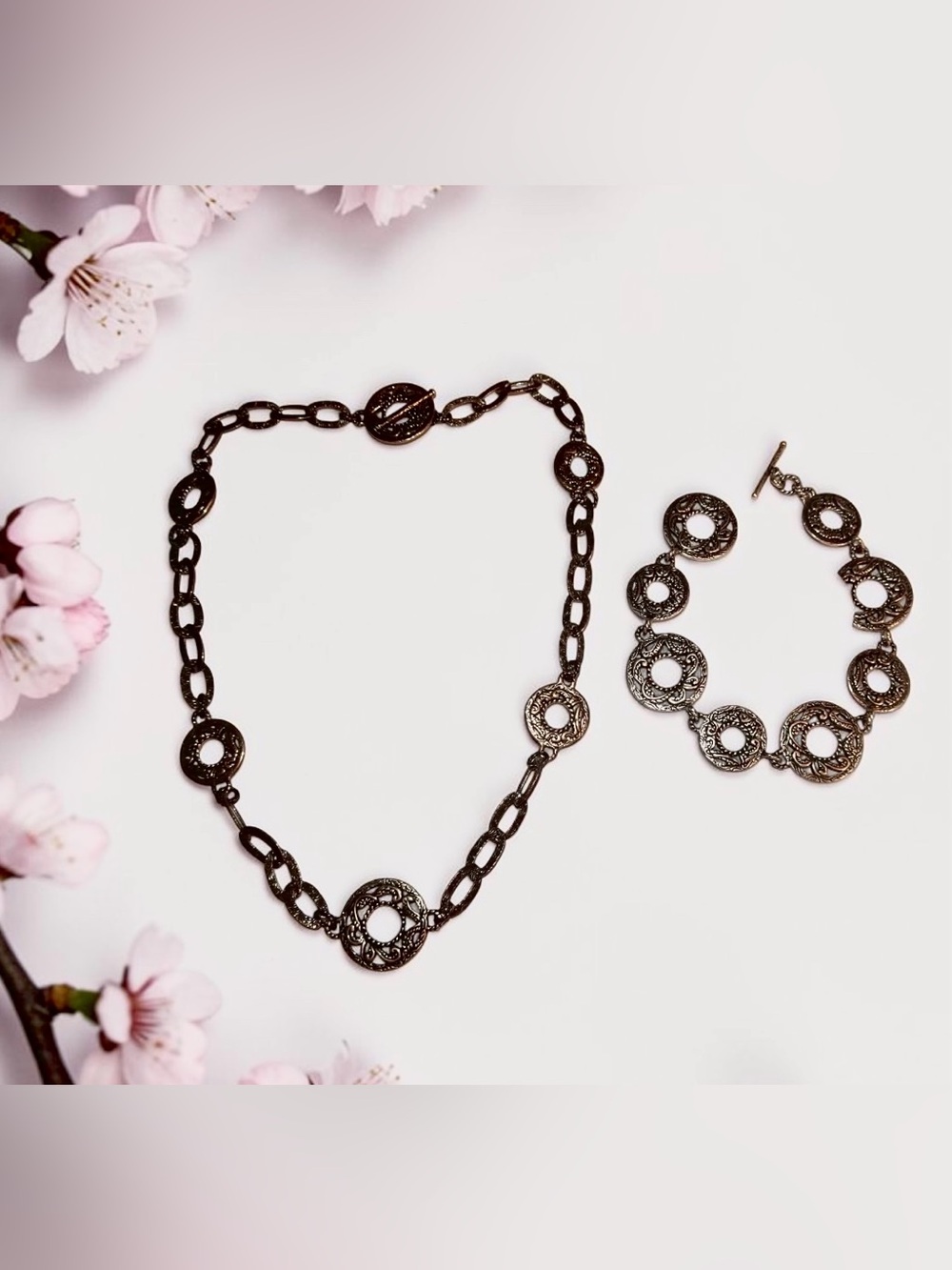 Carolyn Pollack features intricate, openwork circular links crafted from SS